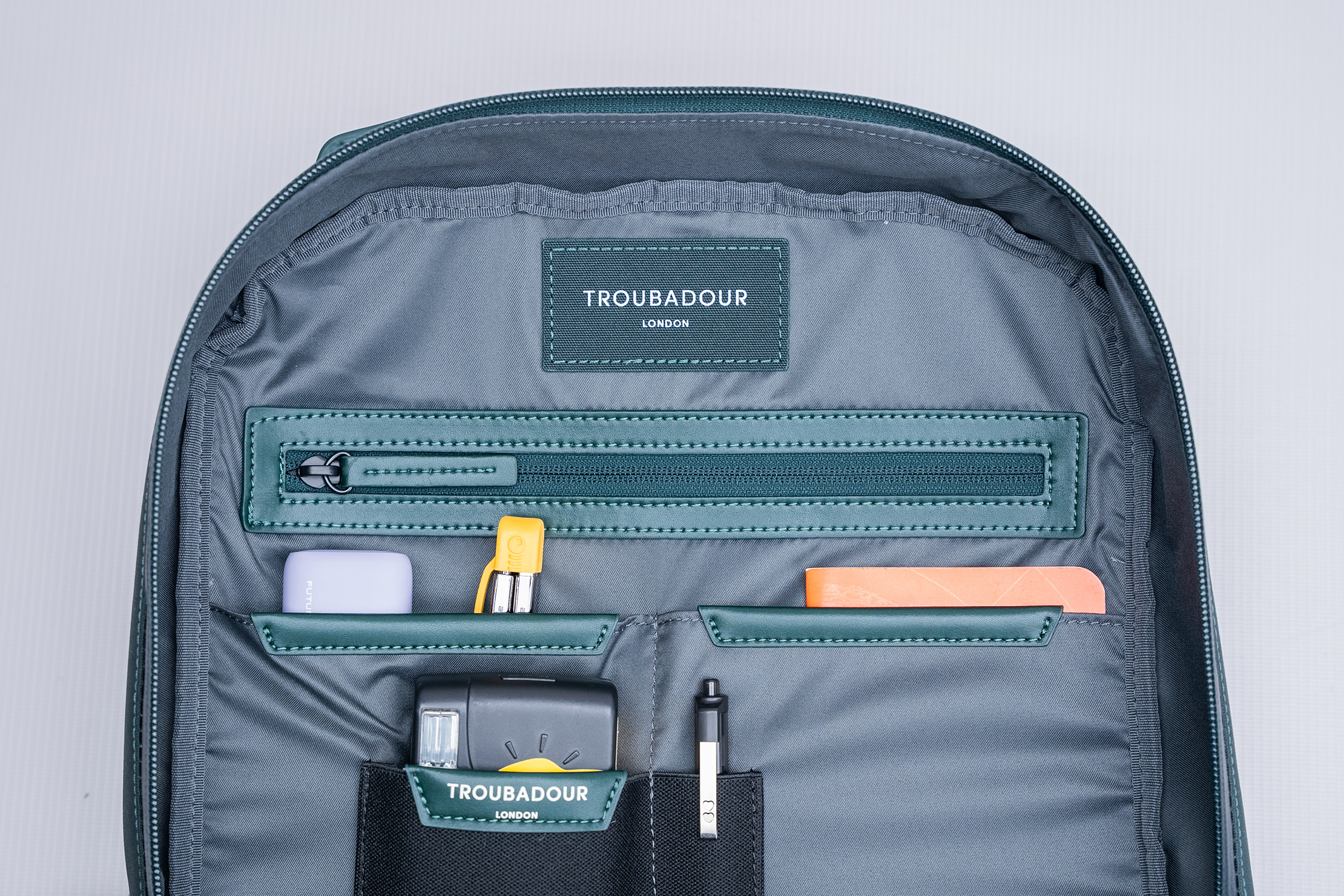 How many compartments does the Troubadour Apex Backpack have?